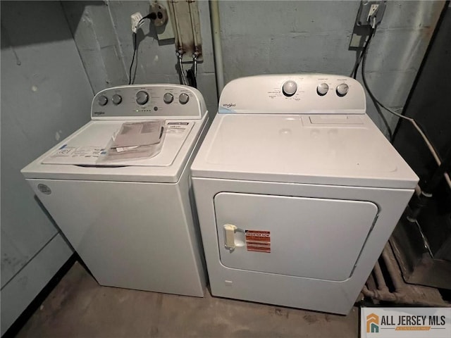 washroom featuring independent washer and dryer and laundry area
