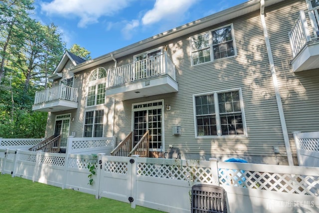 97 Osprey Dr, Old Bridge, NJ 08857 - rear view of property featuring a balcony and heating unit