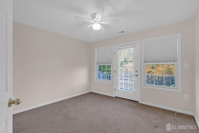 97 Osprey Dr, Old Bridge, NJ 08857 - empty room featuring carpet, attic access, and a ceiling fan