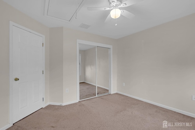 97 Osprey Dr, Old Bridge, NJ 08857 - unfurnished bedroom featuring attic access, carpet floors, a closet, and ceiling fan