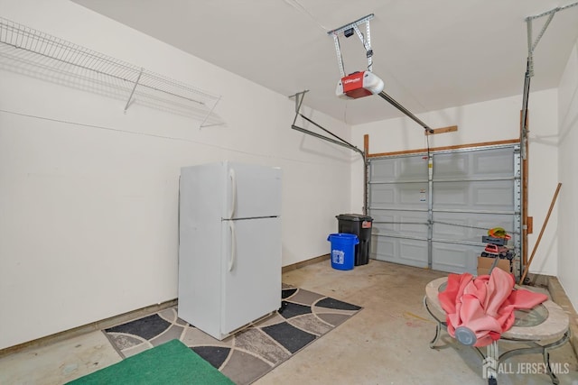 97 Osprey Dr, Old Bridge, NJ 08857 - garage featuring freestanding refrigerator and a garage door opener