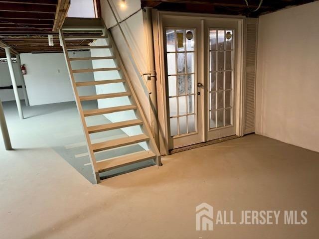 basement featuring french doors