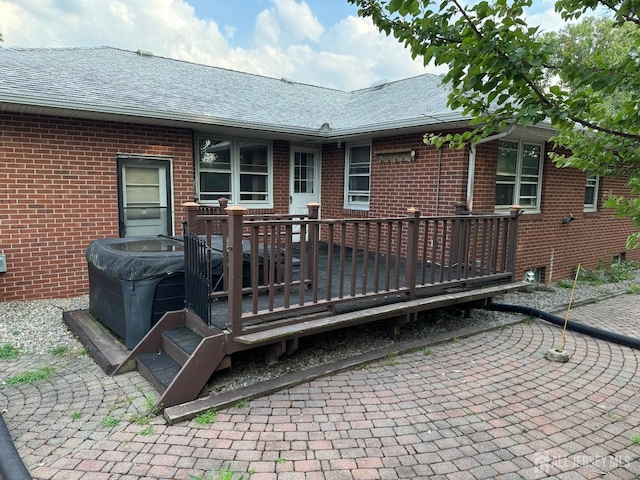 rear view of house with a deck