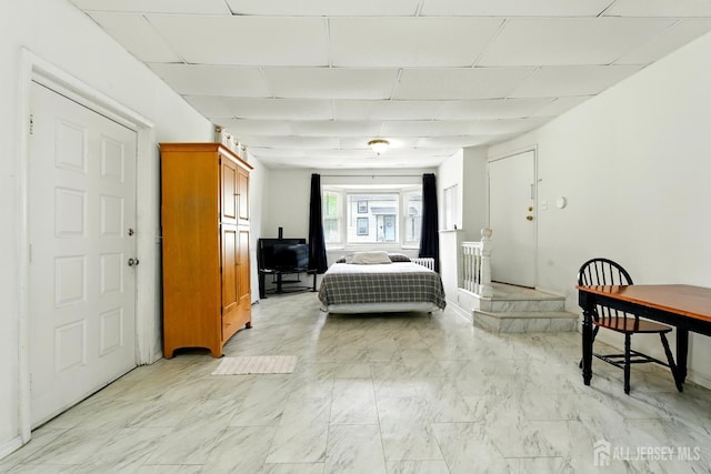 309 1st St, Keyport, NJ 07735 - bedroom with a drop ceiling and light marble finish floors