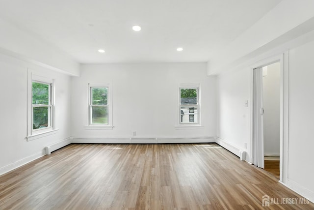 309 1st St, Keyport, NJ 07735 - spare room featuring plenty of natural light, light wood-type flooring, and recessed lighting