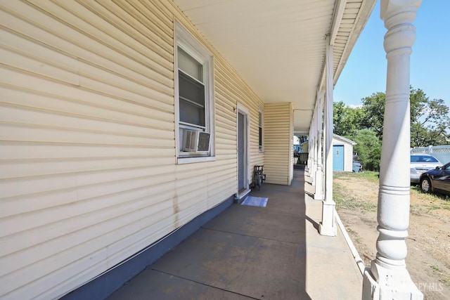 309 1st St, Keyport, NJ 07735 - view of property exterior with cooling unit and an outdoor structure