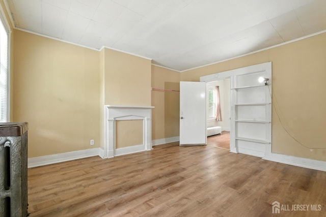 309 1st St, Keyport, NJ 07735 - unfurnished living room with ornamental molding and wood finished floors