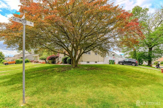 2 Bradley Dr, Edison, NJ 08817 - view of front of house with a front lawn