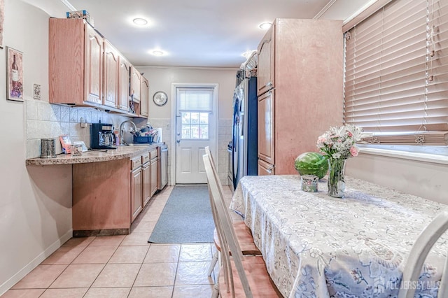 2 Bradley Dr, Edison, NJ 08817 - kitchen featuring light countertops, light tile patterned flooring, light brown cabinetry, crown molding, and dishwasher