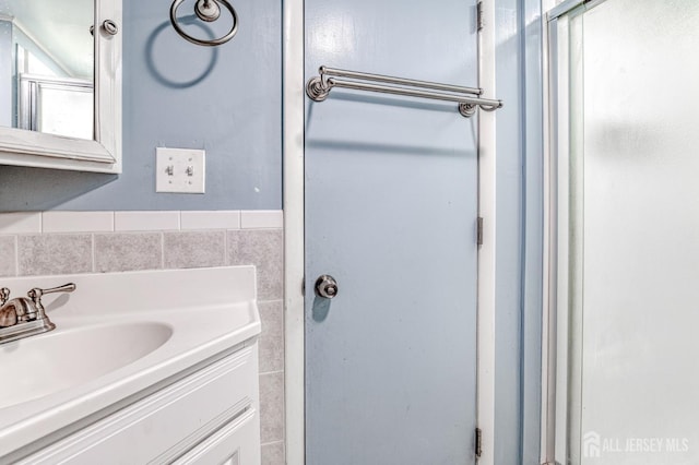 2 Bradley Dr, Edison, NJ 08817 - full bath with vanity, tile walls, and a shower with door