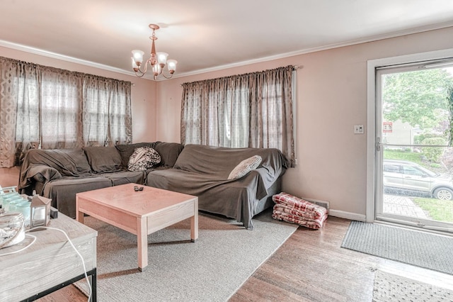 2 Bradley Dr, Edison, NJ 08817 - living room featuring a chandelier, crown molding, and wood finished floors