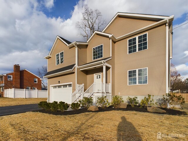 view of front of home featuring a garage