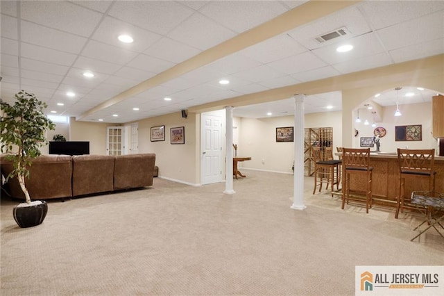 9 Lavender Way E, Brunswick, NJ 08816 - carpeted living area with a dry bar, a paneled ceiling, decorative columns, and recessed lighting