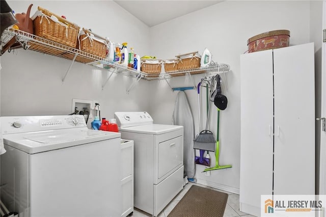 9 Lavender Way E, Brunswick, NJ 08816 - laundry area with separate washer and dryer and light tile patterned flooring