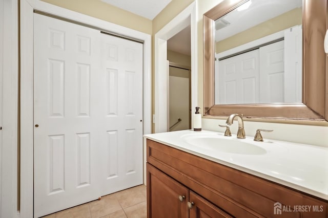 bathroom featuring vanity and tile patterned floors