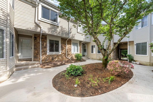 1058 Schmidt Ln, North Brunswick, NJ 08902 - exterior space featuring stone siding