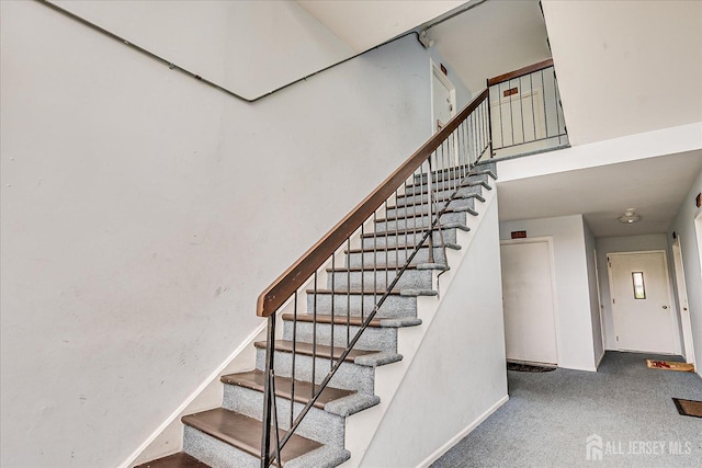 223 Edison Glen Ter, Edison, NJ 08837 - stairway with baseboards and a high ceiling