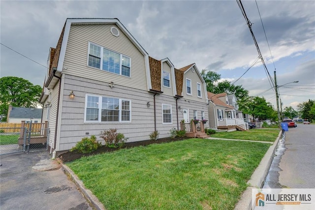 607 Almon Ave, Woodbridge Proper, NJ 07095 - dutch colonial with a gambrel roof and a residential view