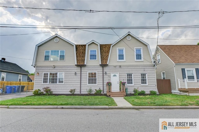 607 Almon Ave, Woodbridge Proper, NJ 07095 - colonial inspired home with a gambrel roof and a shingled roof