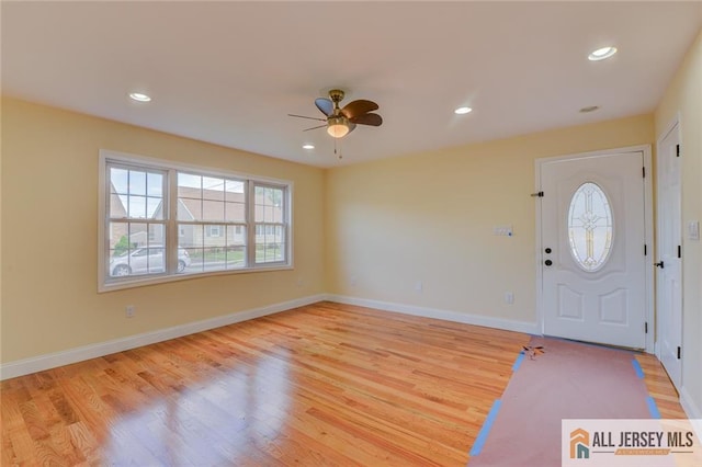 entrance foyer with a ceiling fan, light wood-style flooring, baseboards, and recessed lighting