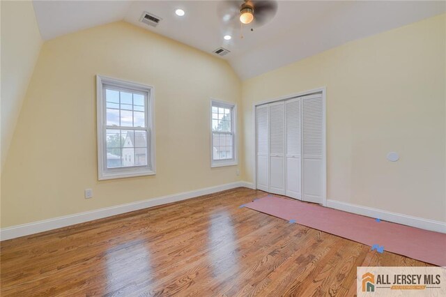 607 Almon Ave, Woodbridge Proper, NJ 07095 - unfurnished bedroom with vaulted ceiling, wood finished floors, a closet, and ceiling fan