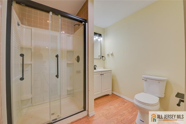 607 Almon Ave, Woodbridge Proper, NJ 07095 - full bath with wood finished floors, a stall shower, and vanity