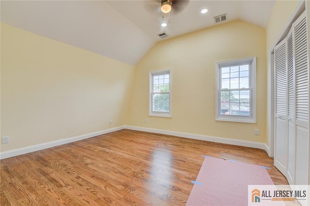 607 Almon Ave, Woodbridge Proper, NJ 07095 - unfurnished bedroom with wood finished floors, lofted ceiling, a closet, recessed lighting, and ceiling fan