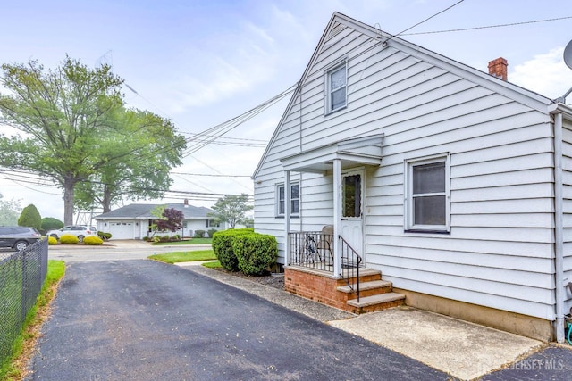 125 Deerfield Rd, Sayreville, NJ 08872 - view of front of property featuring a chimney