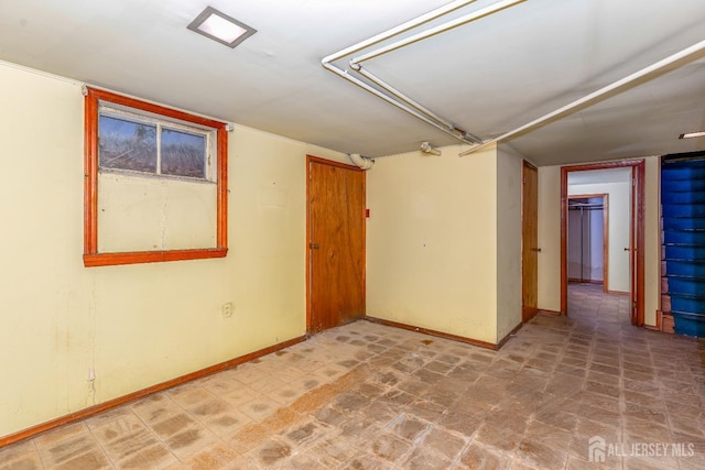 125 Deerfield Rd, Sayreville, NJ 08872 - unfurnished room with baseboards and tile patterned floors