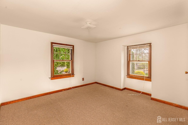 125 Deerfield Rd, Sayreville, NJ 08872 - empty room with carpet and baseboards