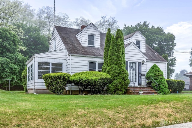 125 Deerfield Rd, Sayreville, NJ 08872 - cape cod house featuring a front yard and a chimney