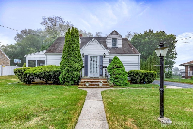 125 Deerfield Rd, Sayreville, NJ 08872 - cape cod-style house featuring a chimney