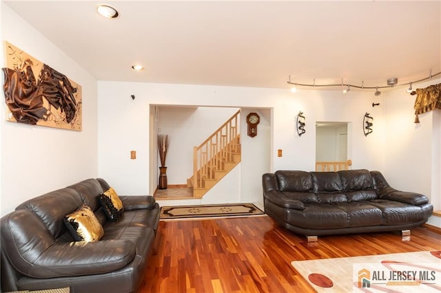96 Riverbend Dr, North Brunswick, NJ 08902 - living area with wood finished floors, stairs, and recessed lighting