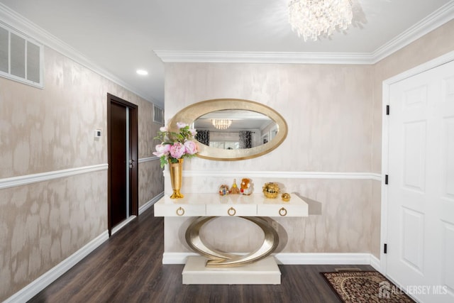 bathroom with crown molding, an inviting chandelier, and wood-type flooring