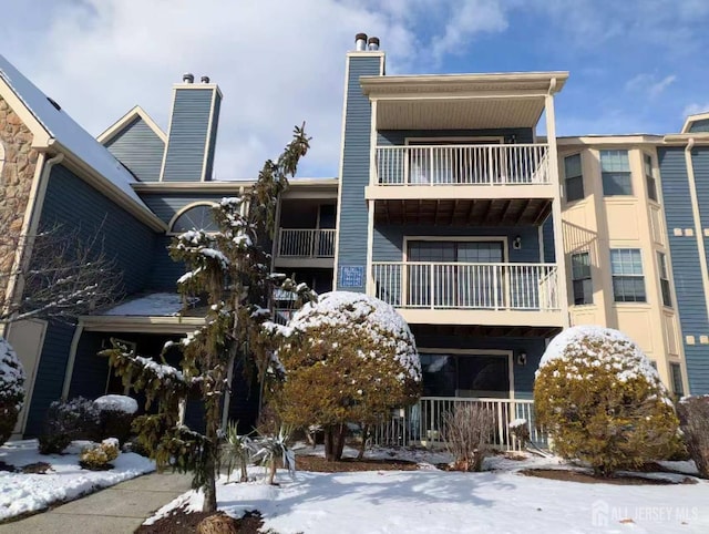 view of snow covered property