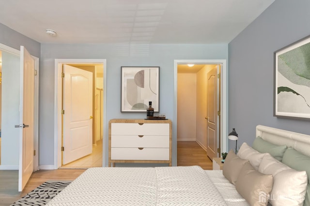 914 Cedar Ct, New Brunswick, NJ 08901 - bedroom featuring baseboards and light wood-style floors