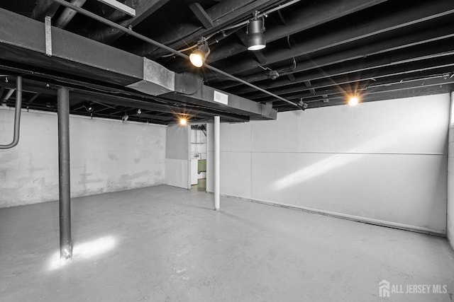 unfinished basement with visible vents