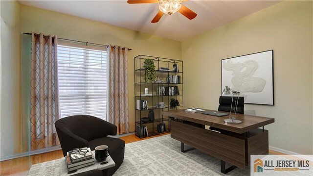 office area featuring ceiling fan and light hardwood / wood-style floors