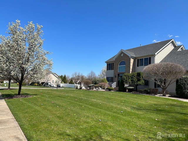 exterior space featuring a front yard