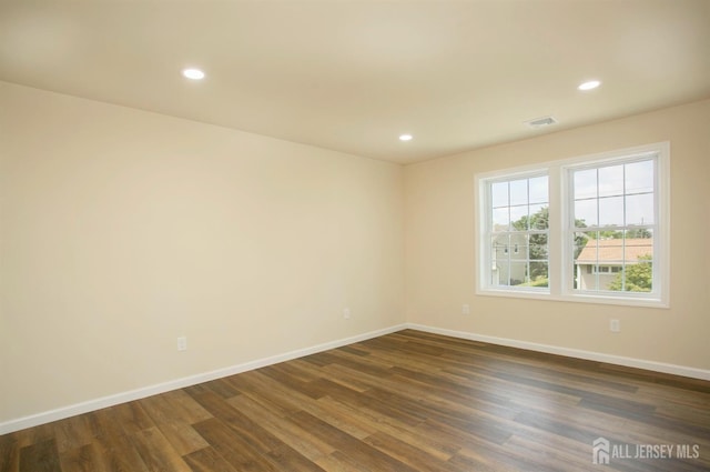 15 Bradley Dr, Edison, NJ 08817 - unfurnished room featuring dark wood-type flooring and recessed lighting