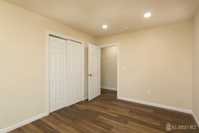 15 Bradley Dr, Edison, NJ 08817 - unfurnished bedroom with dark wood-type flooring, recessed lighting, and a closet