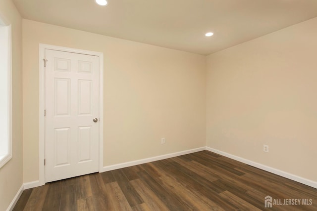 15 Bradley Dr, Edison, NJ 08817 - empty room featuring dark wood-style floors and recessed lighting