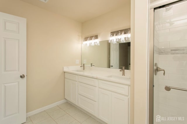 15 Bradley Dr, Edison, NJ 08817 - bathroom featuring tile patterned floors, double vanity, and tiled shower