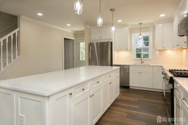 15 Bradley Dr, Edison, NJ 08817 - kitchen featuring appliances with stainless steel finishes, backsplash, recessed lighting, white cabinets, and dark wood-style flooring