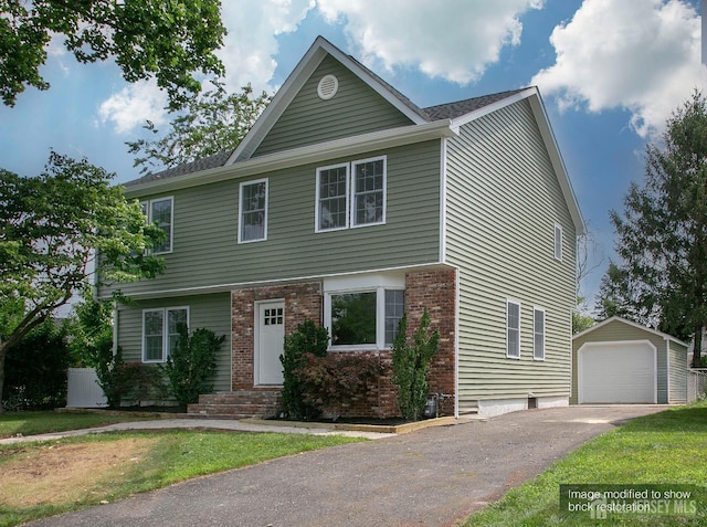 15 Bradley Dr, Edison, NJ 08817 - view of front of home with driveway, an outdoor structure, a detached garage, entry steps, and brick siding
