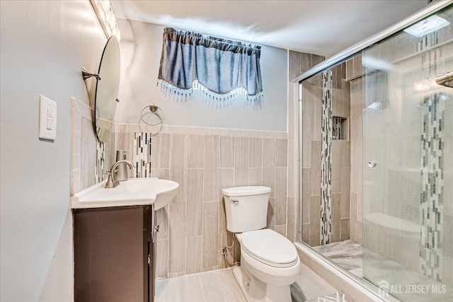 5 Alvin Ct, Menlo Park Terrace, NJ 08840 - full bathroom with vanity, tile walls, a shower stall, and wainscoting