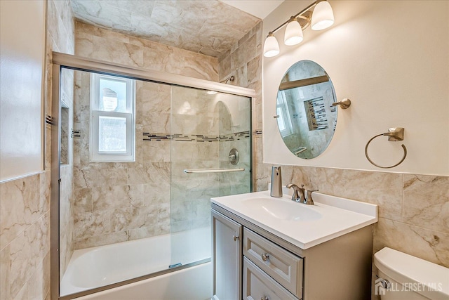 5 Alvin Ct, Menlo Park Terrace, NJ 08840 - bathroom with vanity, enclosed tub / shower combo, and tile walls