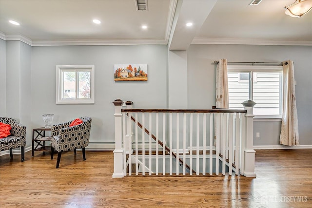 5 Alvin Ct, Menlo Park Terrace, NJ 08840 - sitting room with an upstairs landing, wood finished floors, crown molding, and recessed lighting
