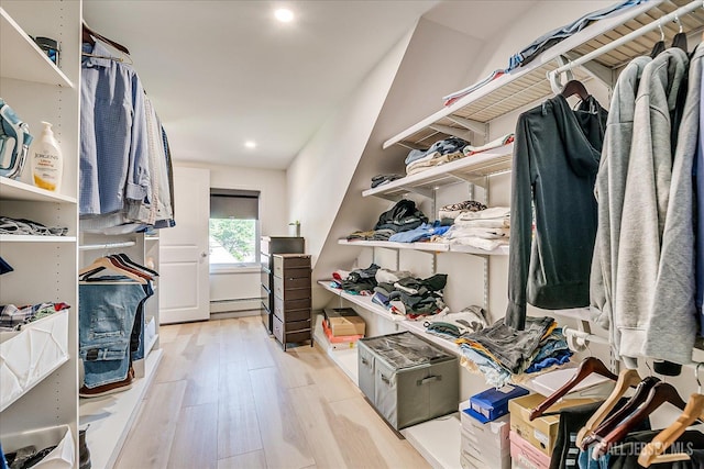 5 Alvin Ct, Menlo Park Terrace, NJ 08840 - walk in closet featuring light wood-style flooring and a baseboard heating unit