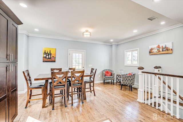 5 Alvin Ct, Menlo Park Terrace, NJ 08840 - dining area featuring healthy amount of natural light, ornamental molding, light wood-style floors, and recessed lighting